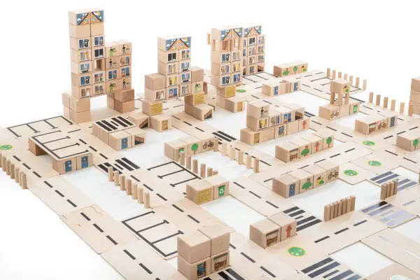 Construction of a city made from wooden construction blocks.