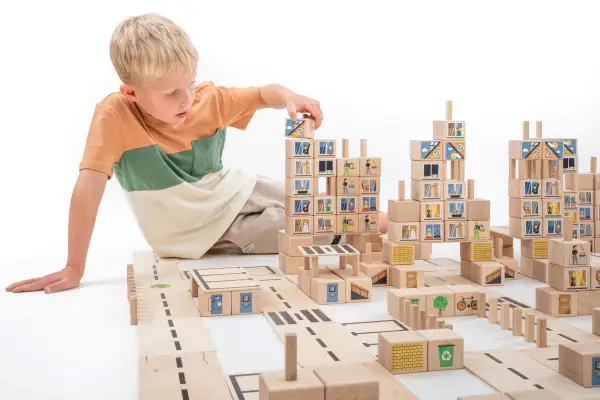 Colorful city construction built from wooden blocks.