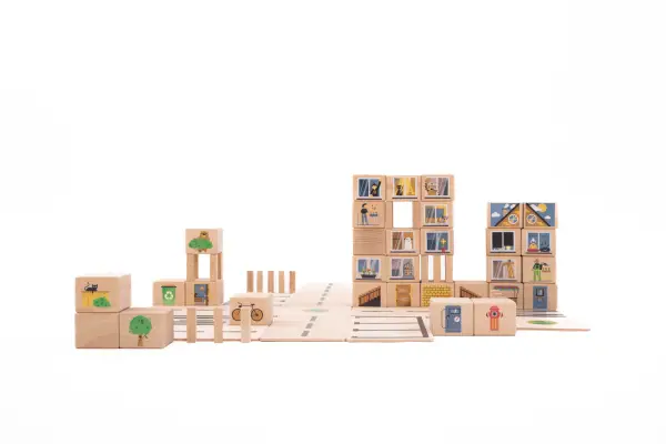 Building a small city from wooden blocks.