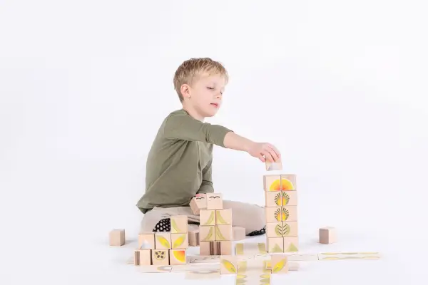 a building made of blocks presenting open-ended play