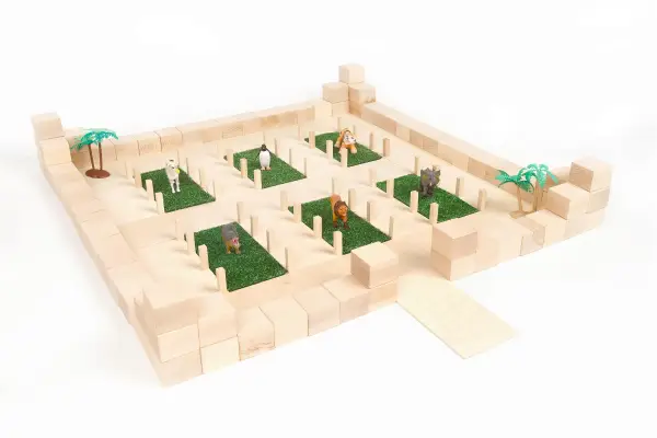 construction of a zoo made of natural wooden blocks