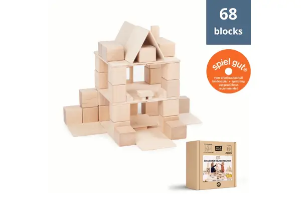 construction of modern building made of wooden blocks