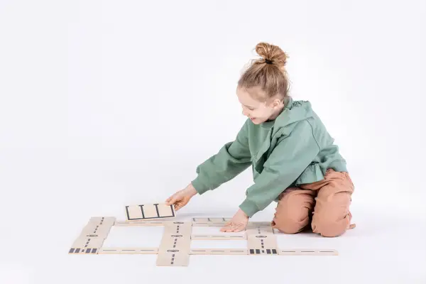 kids playing wooden roads