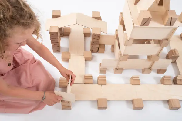 City constructed from wooden building blocks.